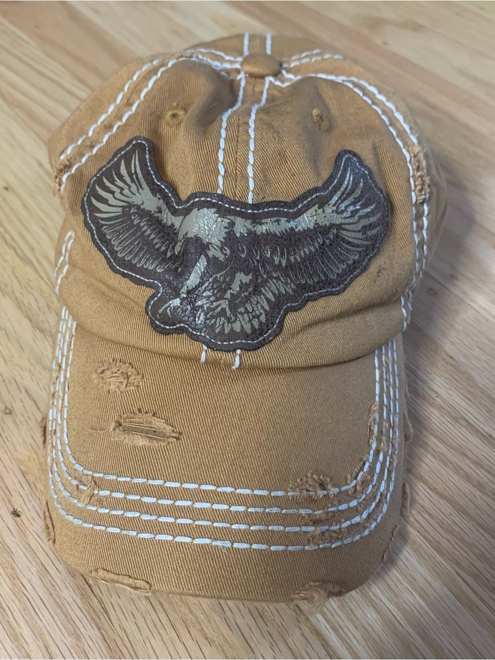 Vintage Distressed Tan Cap with Embroidered Eagle Design